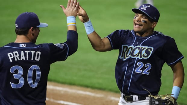 Wilmington's Tyler Hill is greeted by Nick Pratto after Hill made a running catch on a deep drive in the eighth inning of the Blue Rocks' 5-4 win in the second game of the Mils Cup Championship Series Wednesday at Frawley Stadium. Bluerocks 5 Fayetteville 4